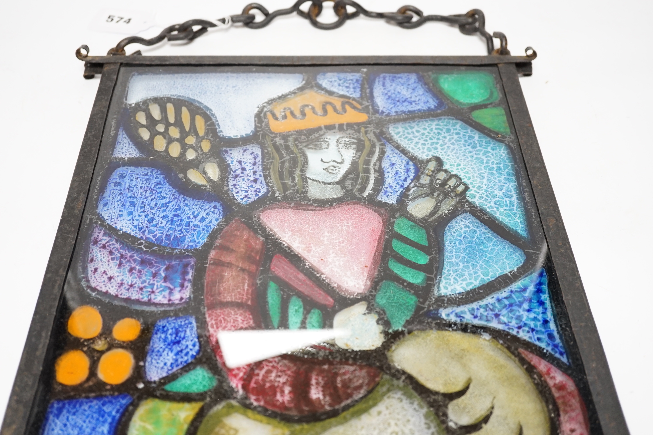 A rectangular wrought iron framed stained glass panel, 44x36cm total